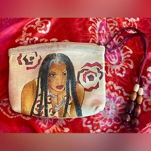Unique Emily Ann hand painted leather pouch w cool wooden beads. Apx 5 1/2 x 7”